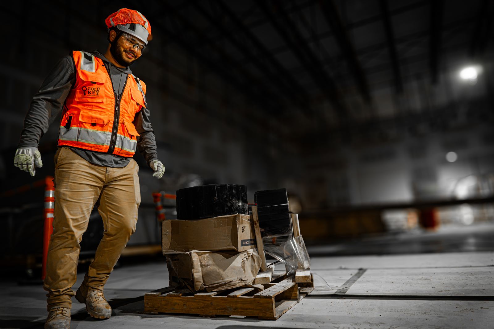 Gold Key crew member moving material