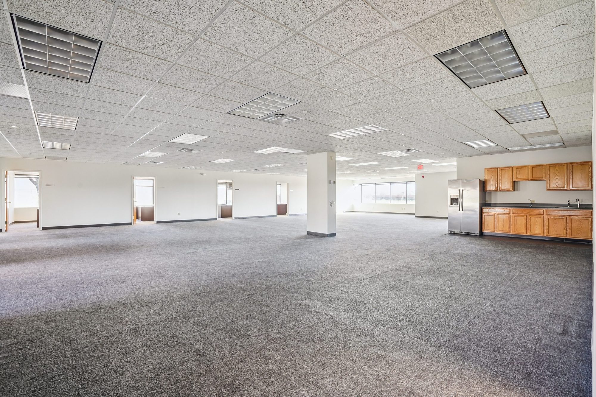 7,700 SF office — open floor with new kitchen and column